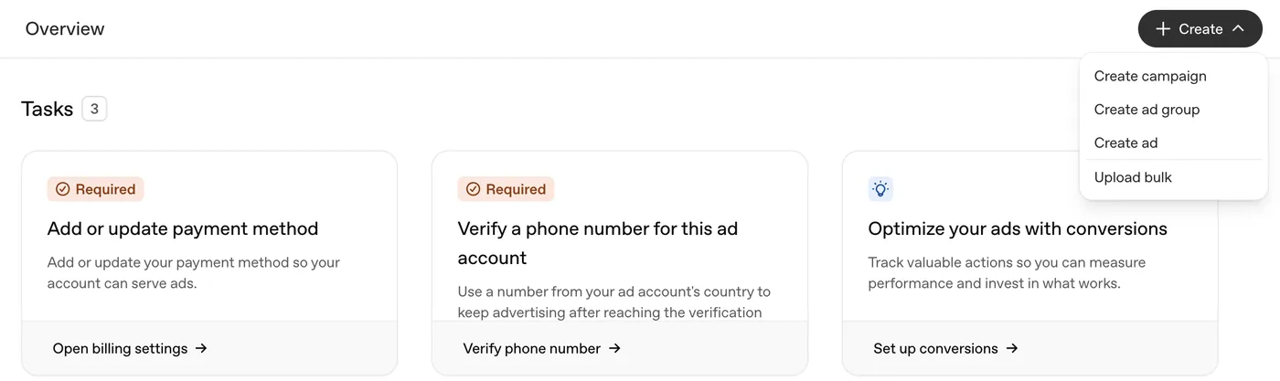 ChatGPT Ads Manager 的 Overview 頁面：右上角 Create 選單有 Create campaign、Create ad group、Create ad 及 Upload bulk，下方列出三項待辦，分別是加入付款方式、驗證帳戶的電話號碼及設定轉換追蹤