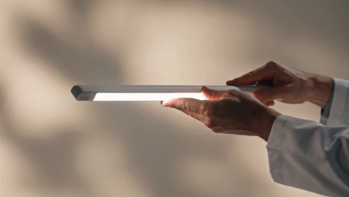 Invented glowing device in an otherwise realistic clinic scene